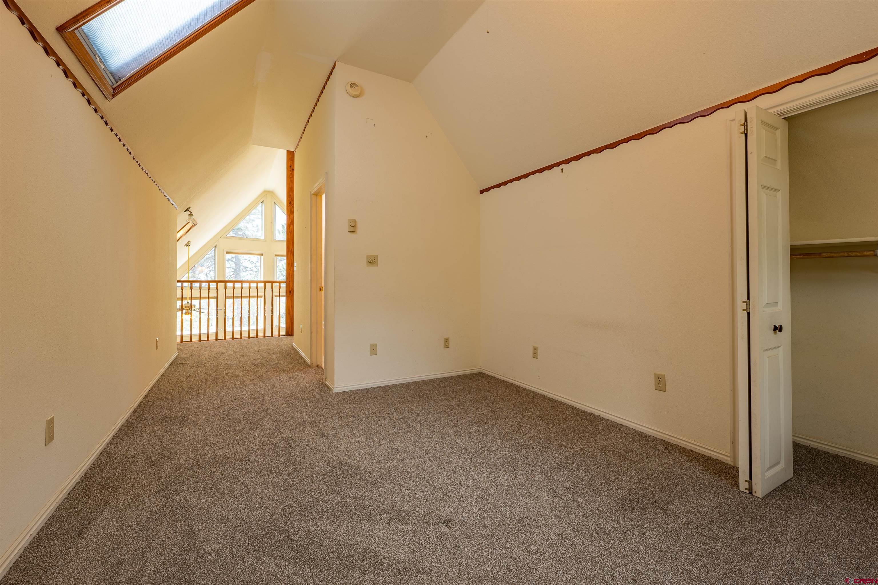 177 Spur Lane Durango, CO 81301 - Photo 21 of 34 a view of a big room with windows