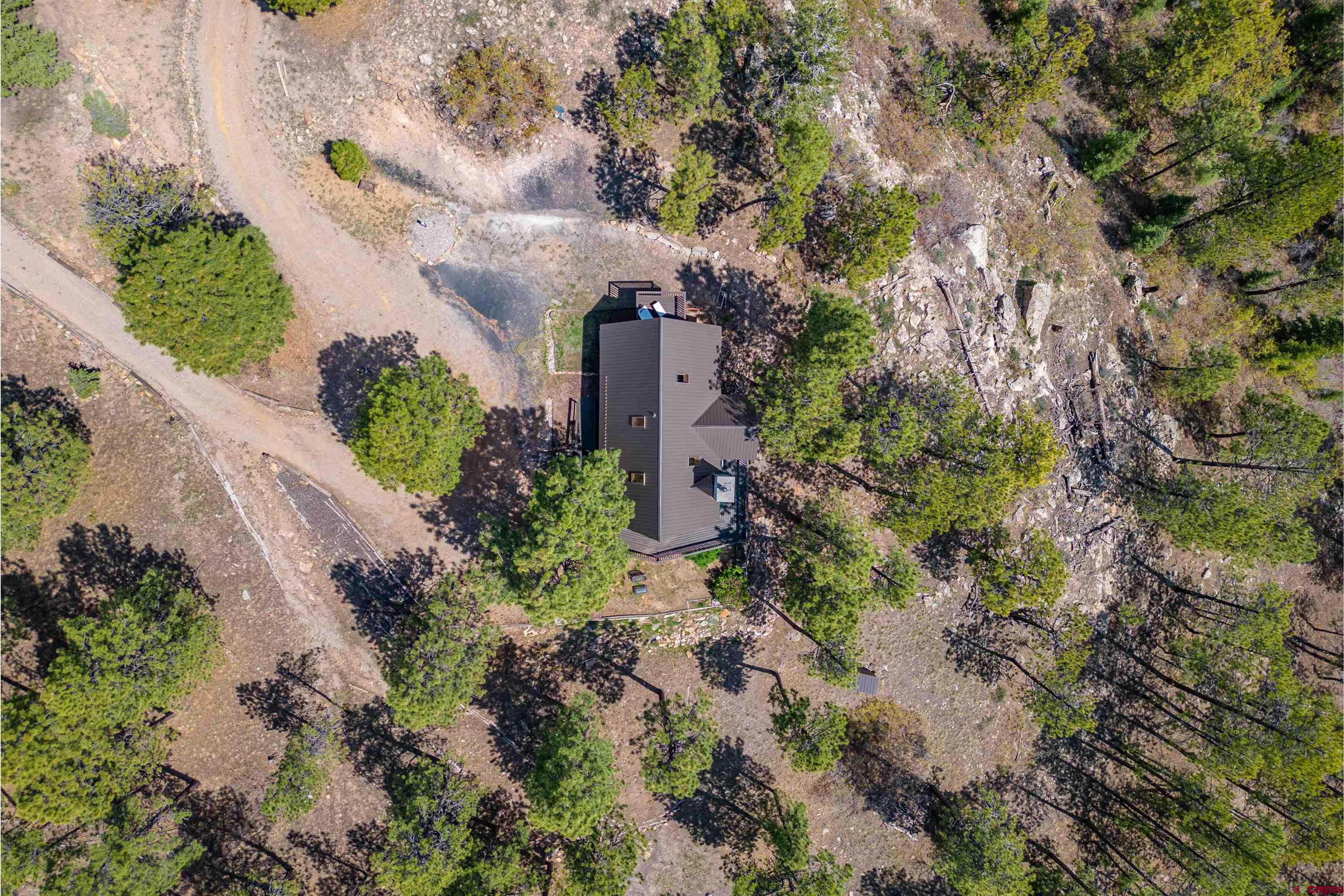177 Spur Lane Durango, CO 81301 - Photo 27 of 34 an aerial view of a house with a yard