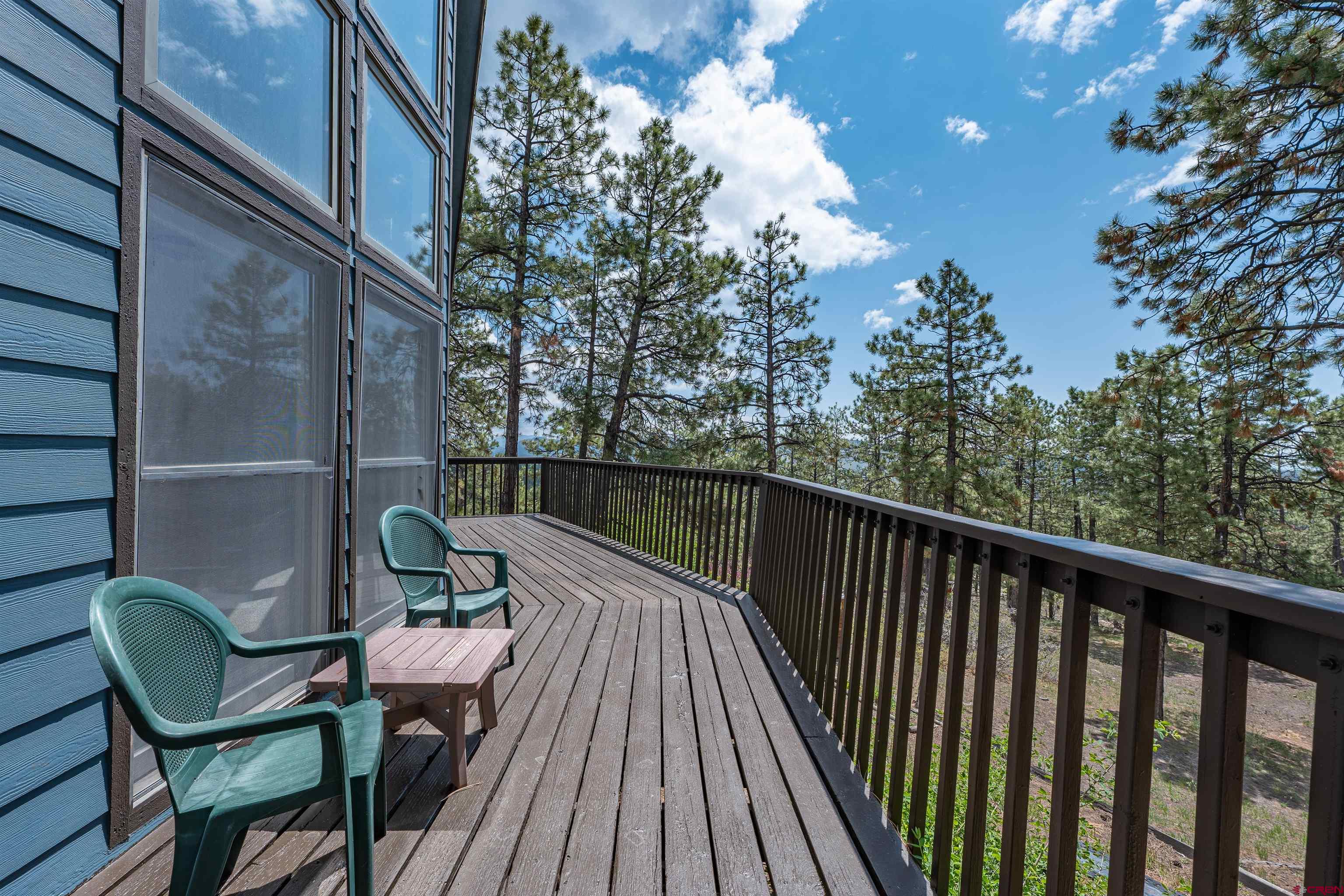 177 Spur Lane Durango, CO 81301 - Photo 32 of 34 a view of balcony with wooden floor and outdoor seating