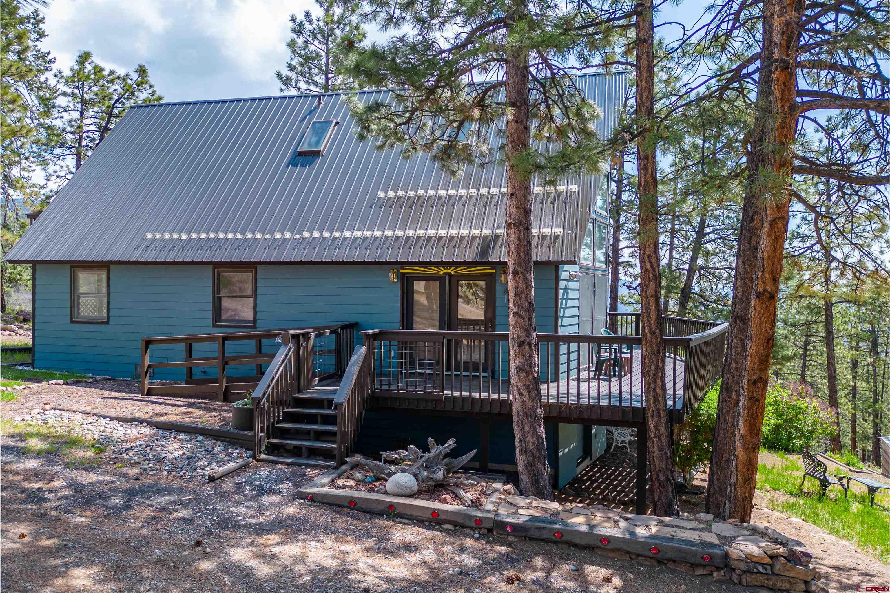 177 Spur Lane Durango, CO 81301 - Photo 4 of 34 a front view of a house