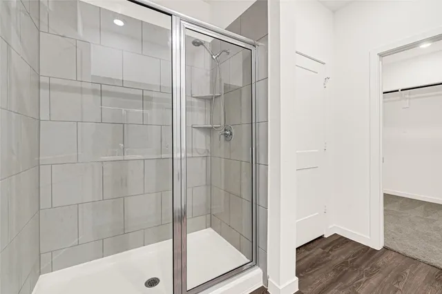 a view of a kitchen from the hallway