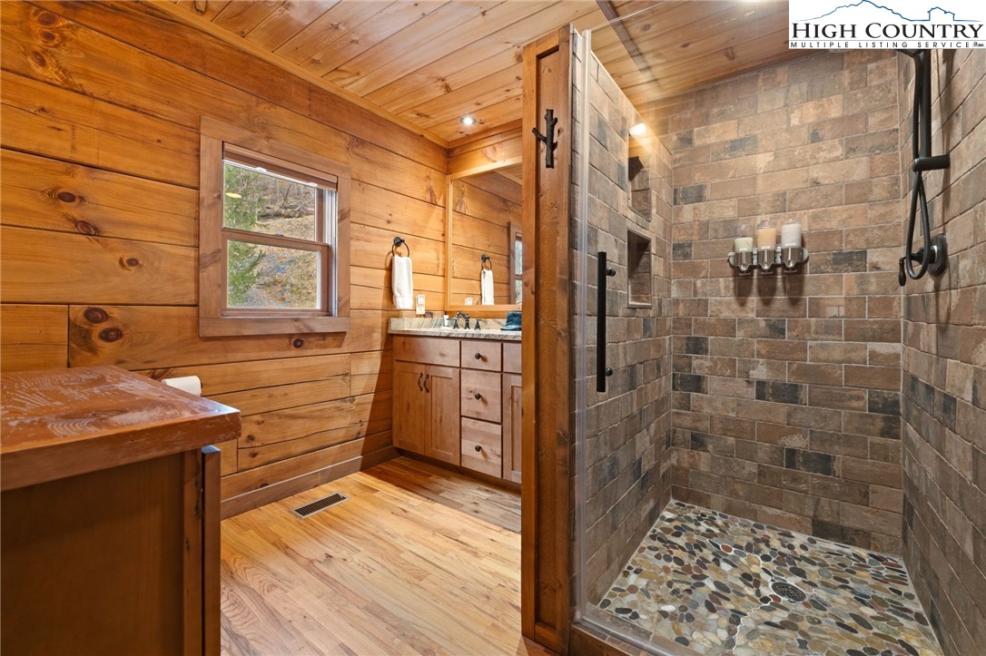 337 Rivers Crest Road Boone, NC 28607 - Photo 13 of 45 a bathroom with a sink and a shower