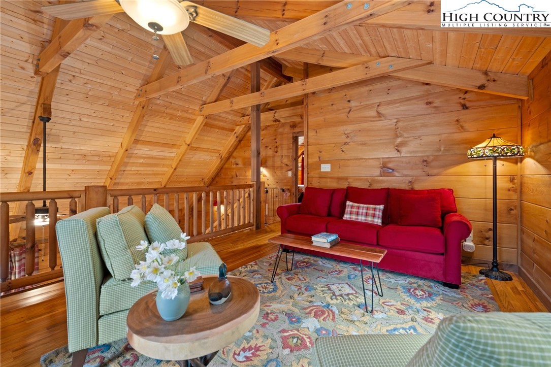337 Rivers Crest Road Boone, NC 28607 - Photo 18 of 45 a outdoor living space with furniture and a rug