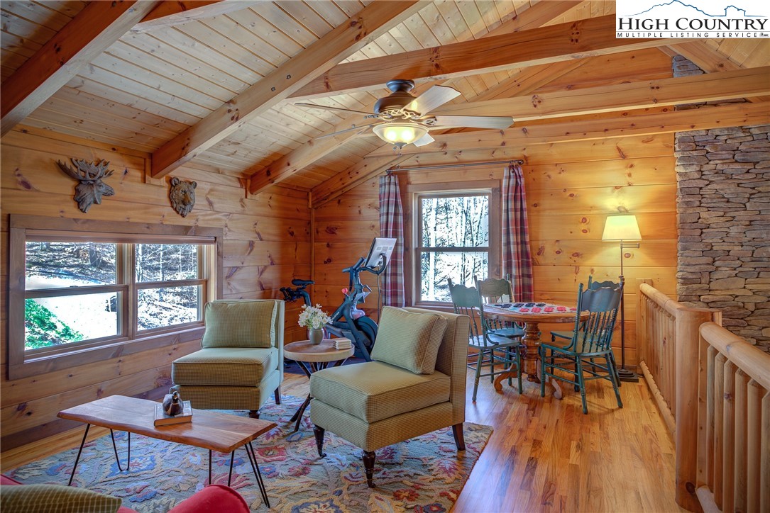 337 Rivers Crest Road Boone, NC 28607 - Photo 20 of 45 a living room with furniture and a large window