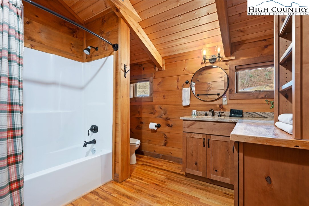 337 Rivers Crest Road Boone, NC 28607 - Photo 23 of 45 a bathroom with a sink a toilet and bathtub
