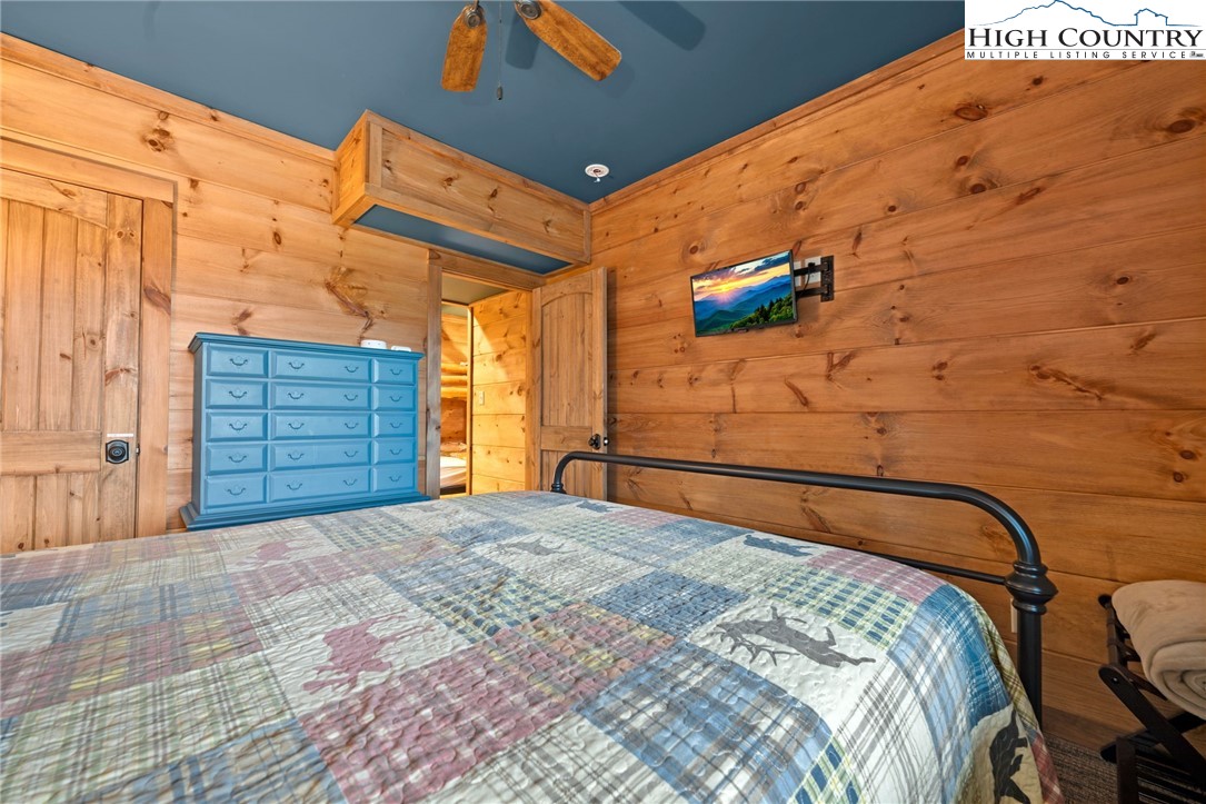 337 Rivers Crest Road Boone, NC 28607 - Photo 28 of 45 a bedroom with a bed and a dresser