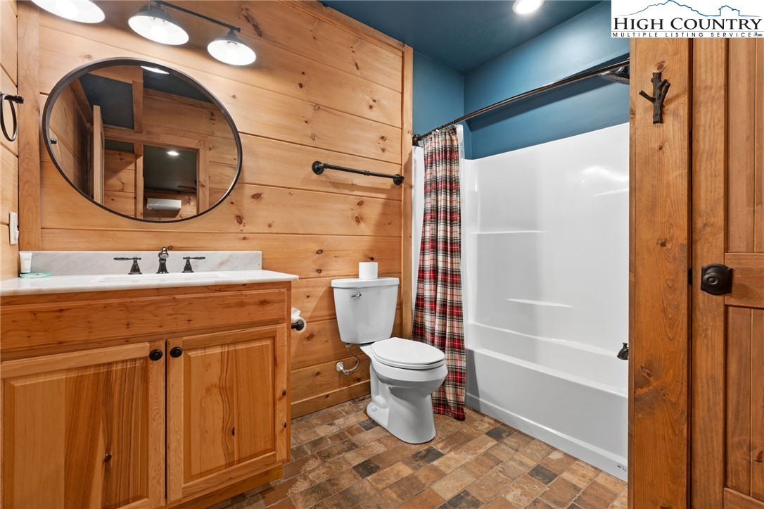 337 Rivers Crest Road Boone, NC 28607 - Photo 29 of 45 a bathroom with a sink toilet and shower