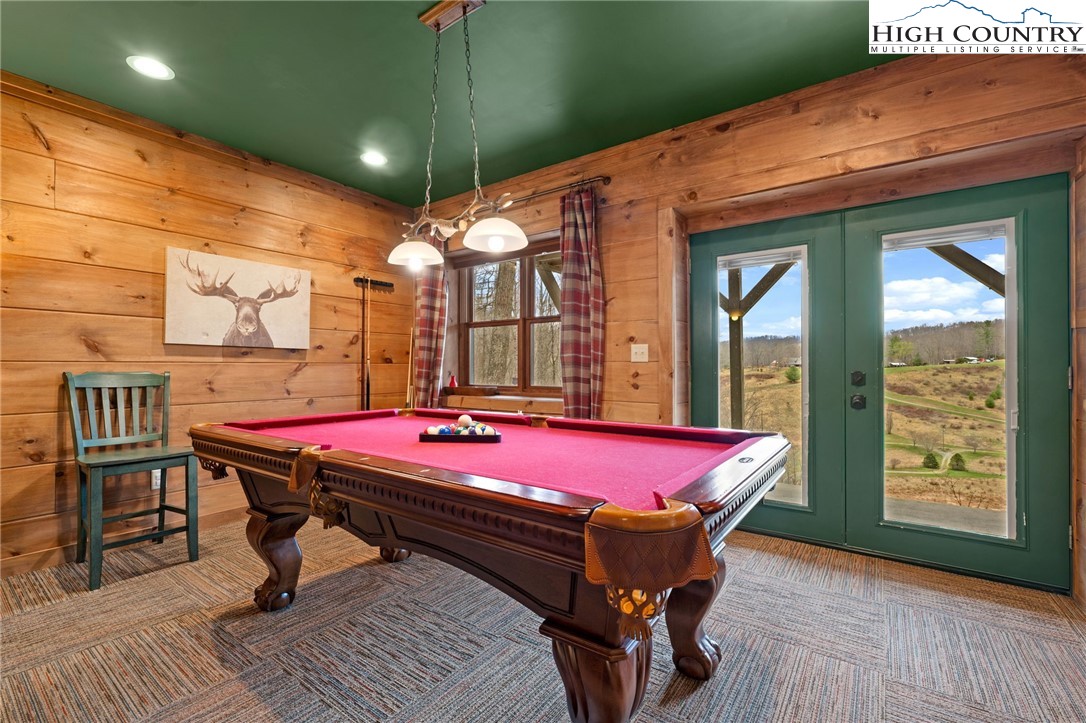 337 Rivers Crest Road Boone, NC 28607 - Photo 31 of 45 a patio with pool table and chairs