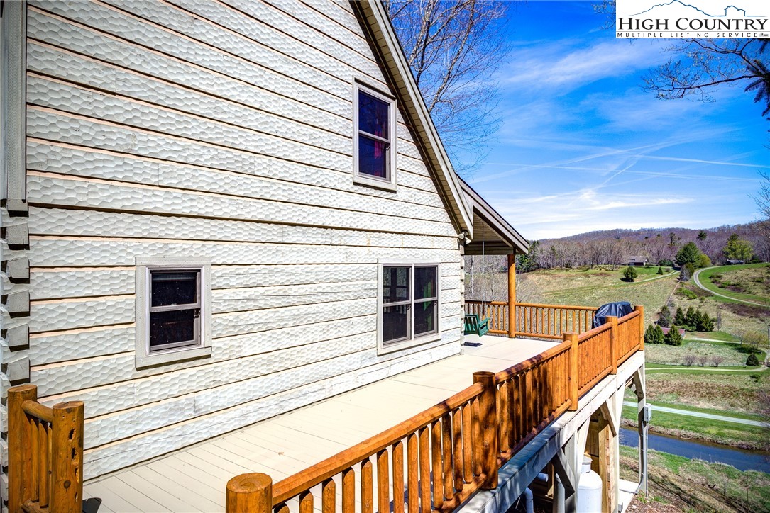 337 Rivers Crest Road Boone, NC 28607 - Photo 35 of 45 a balcony with view of car parked on the street