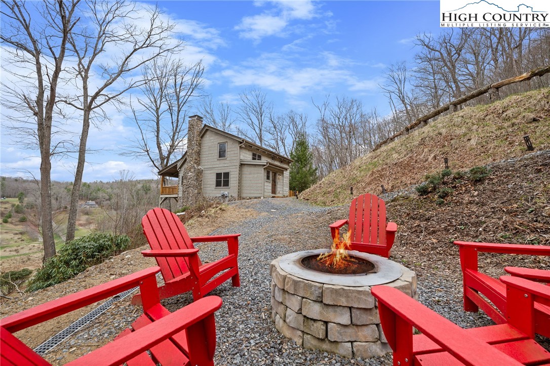 337 Rivers Crest Road Boone, NC 28607 - Photo 36 of 45 a backyard of a house with outdoor seating
