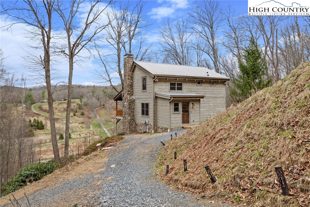 337 Rivers Crest Road Boone, NC 28607 - Photo 38 of 45 a view of a house with a yard