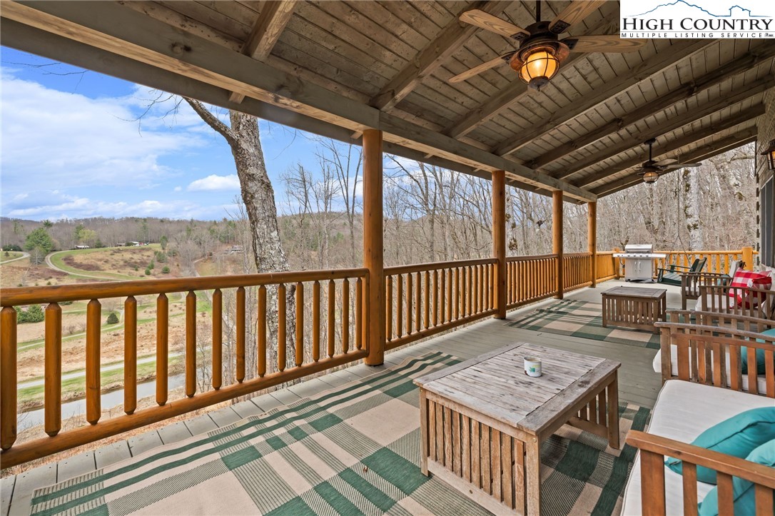 337 Rivers Crest Road Boone, NC 28607 - Photo 8 of 45 a view of a balcony with furniture