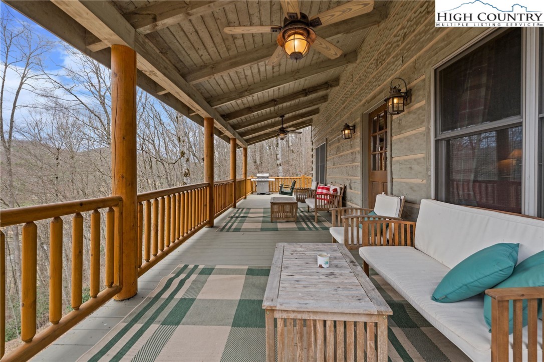 337 Rivers Crest Road Boone, NC 28607 - Photo 9 of 45 a view of a porch with furniture