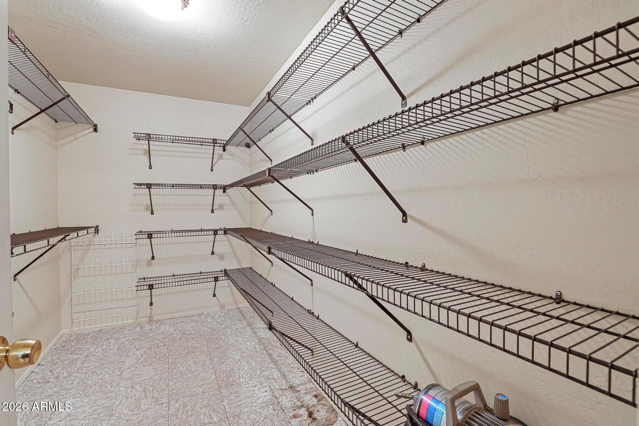 8884 Tonto Rim Drive Pine, AZ 85544 - Photo 16 of 43 a view of a room with racks on the wall