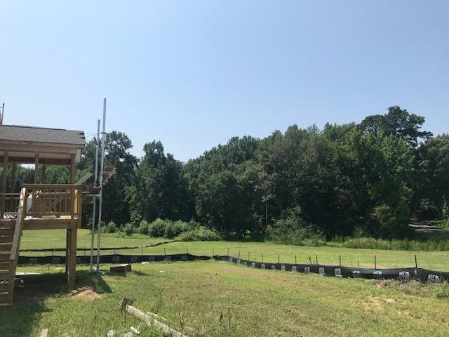 4416 Beckel Road Willow Spring, NC 27592 - Photo 7 of 11 Enjoy your mornings and evening sitting up on your screen porch looking at your wonderful large backyard. screen porc