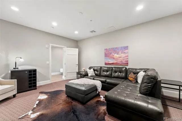 a living room with furniture and a couch