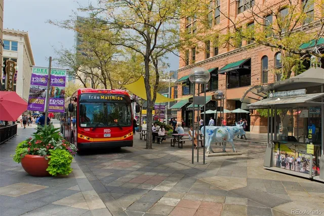 a view of street with sitting area