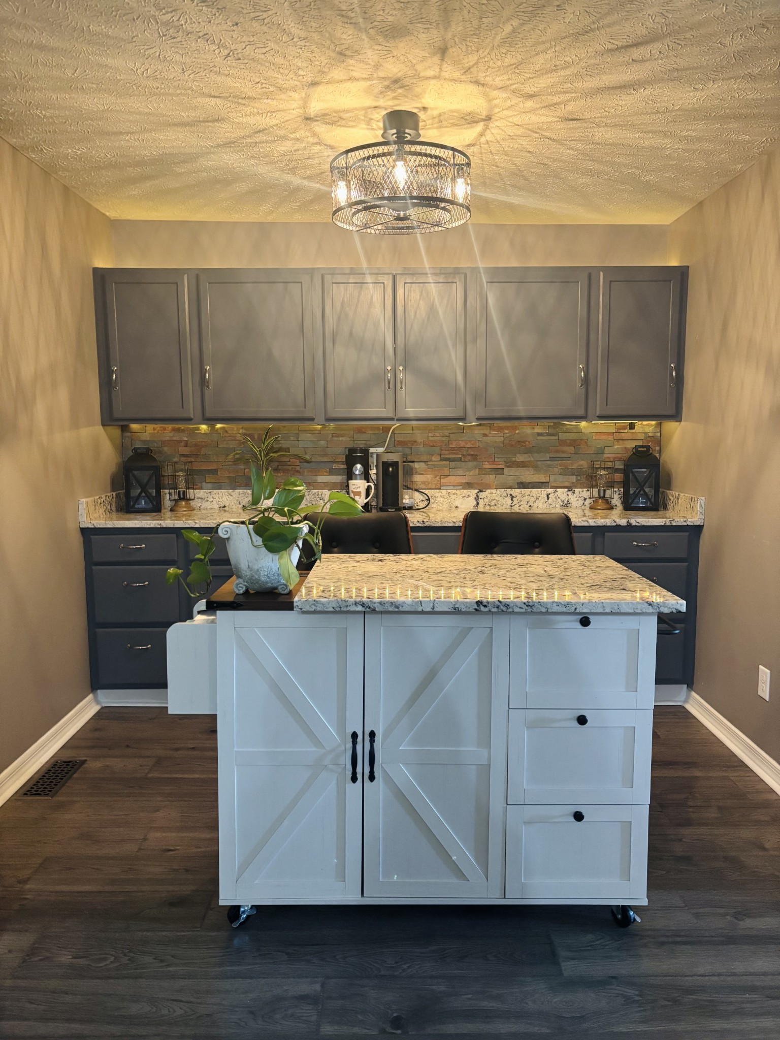 586 Old Snow Hill Road Dowelltown, TN 37059 - Photo 17 of 51 a kitchen with a sink cabinets and wooden floor