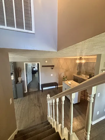 a living room with wooden floor