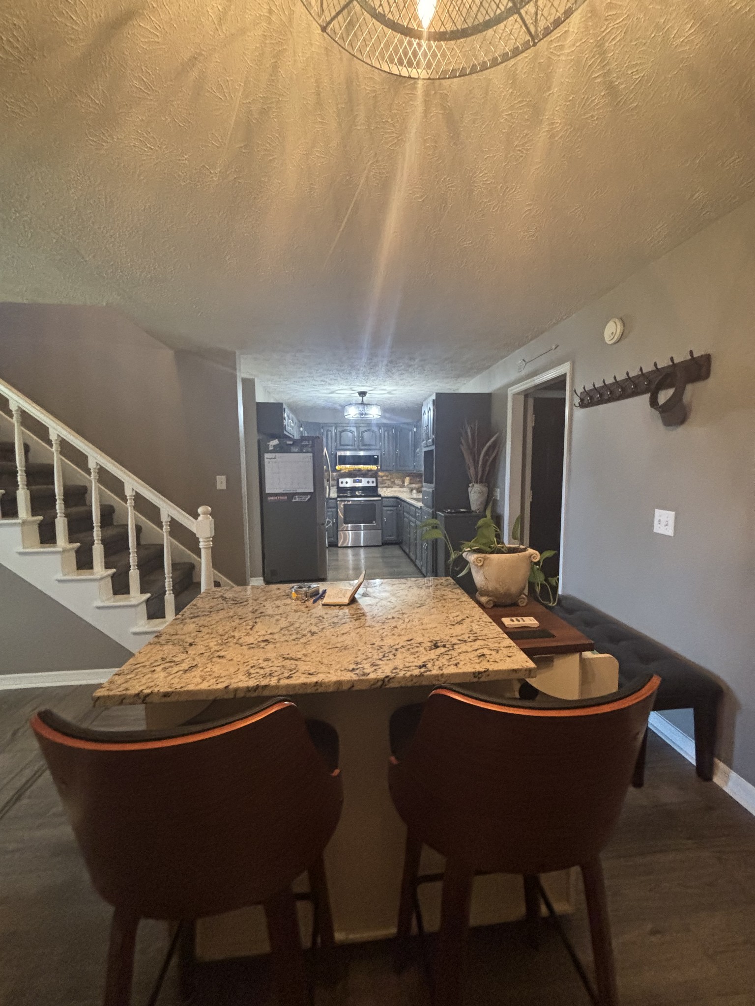 586 Old Snow Hill Road Dowelltown, TN 37059 - Photo 25 of 51 a dining room with a wooden table and chairs