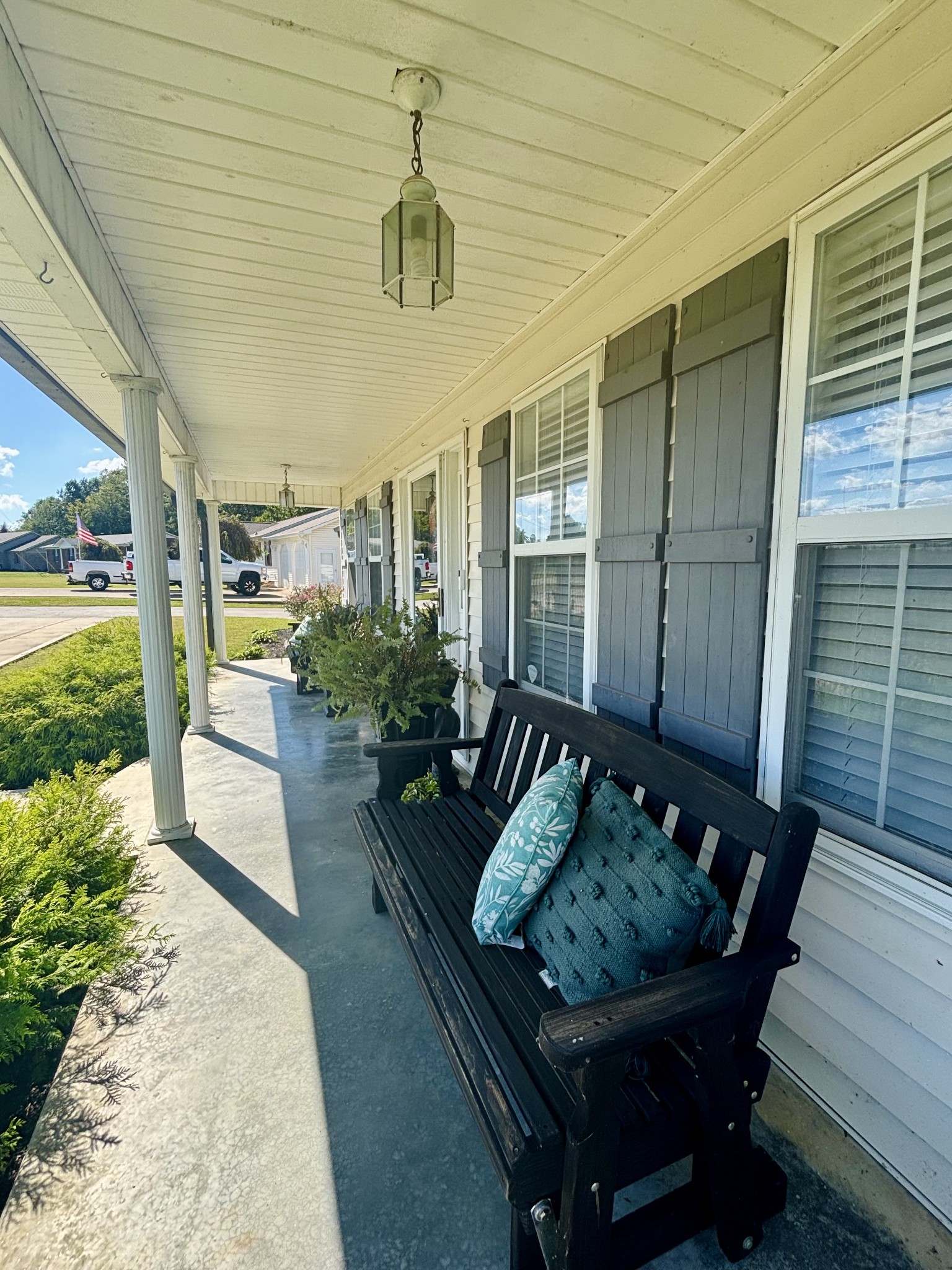 586 Old Snow Hill Road Dowelltown, TN 37059 - Photo 3 of 51 a view of a porch with furniture and a yard