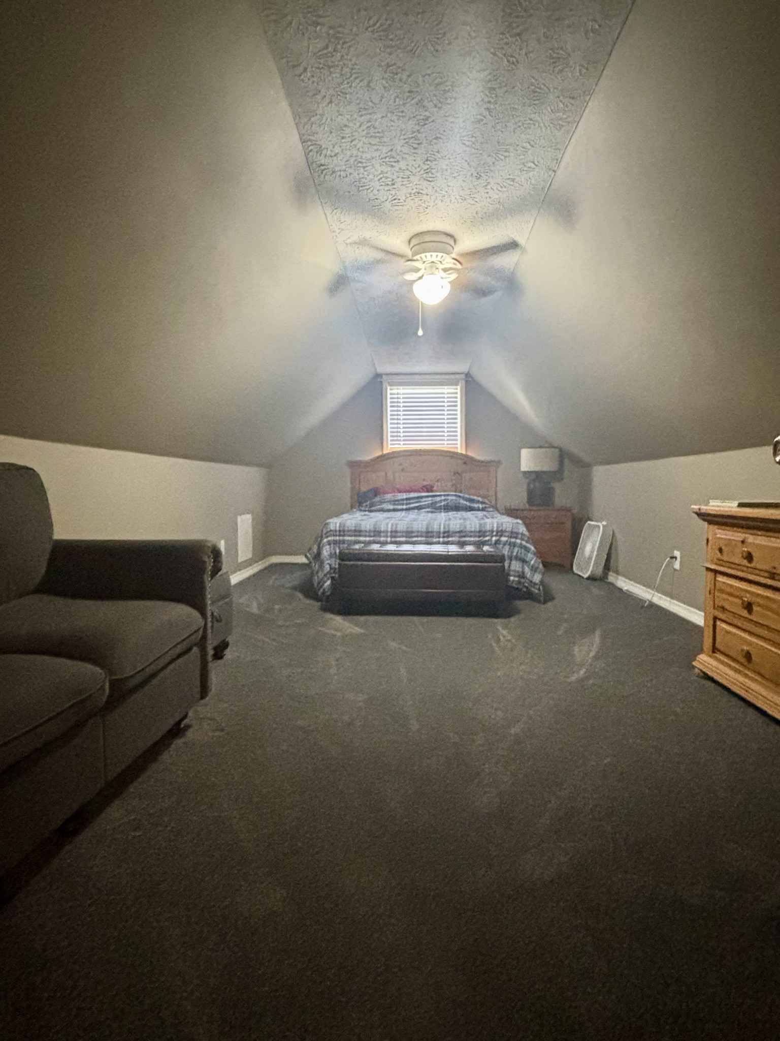 586 Old Snow Hill Road Dowelltown, TN 37059 - Photo 37 of 51 a living room with furniture and a chandelier