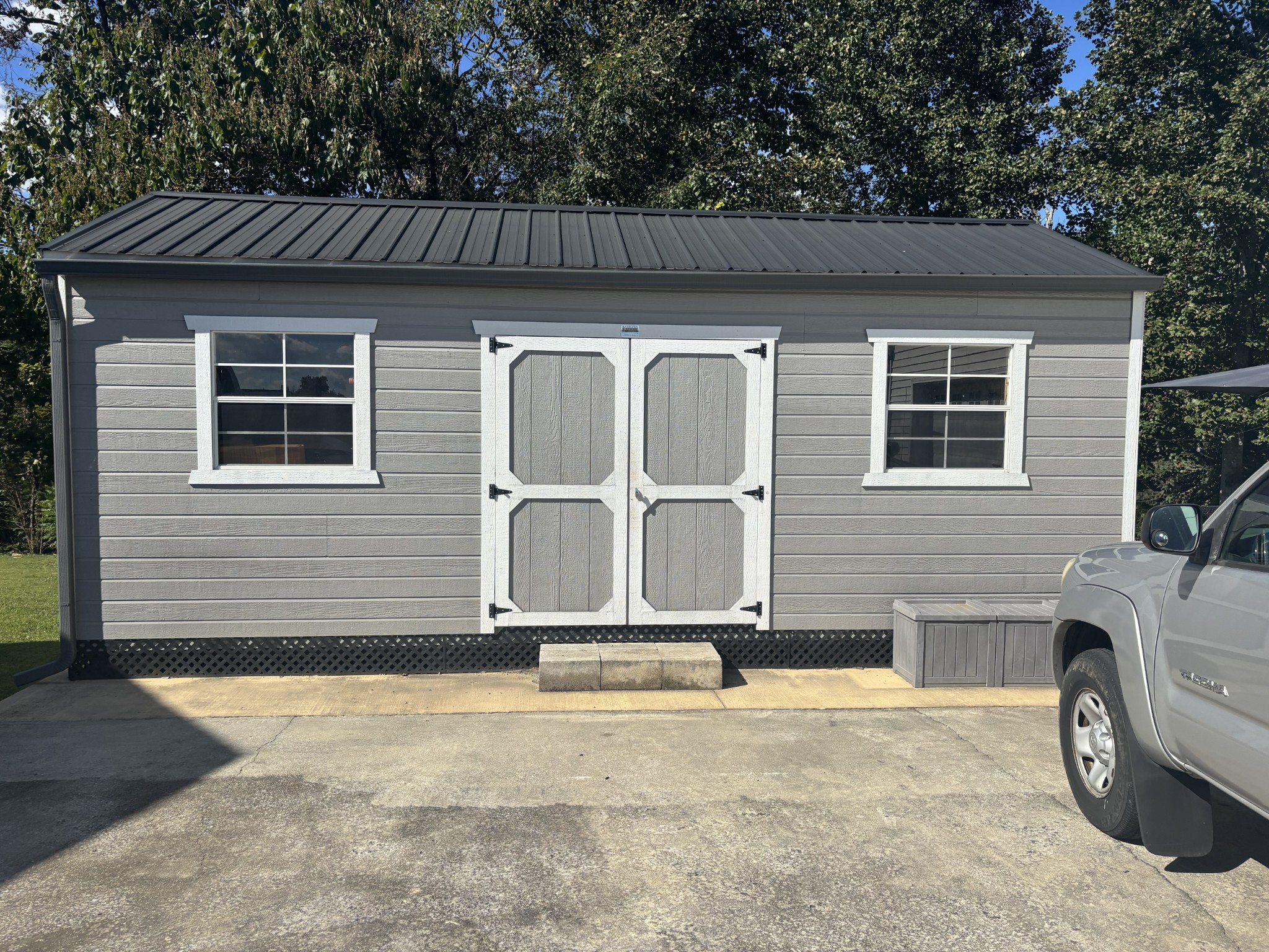 586 Old Snow Hill Road Dowelltown, TN 37059 - Photo 4 of 51 a front view of a house with parking area