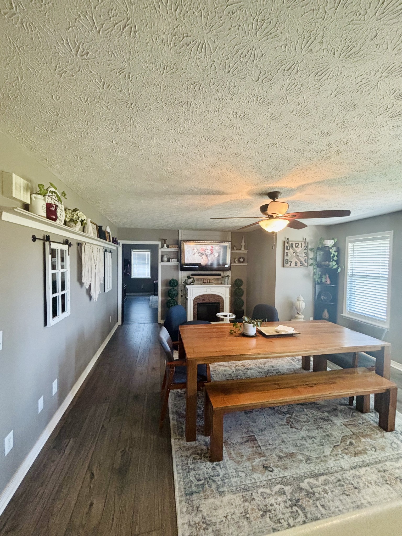 586 Old Snow Hill Road Dowelltown, TN 37059 - Photo 6 of 51 a bedroom with furniture and a wooden floor