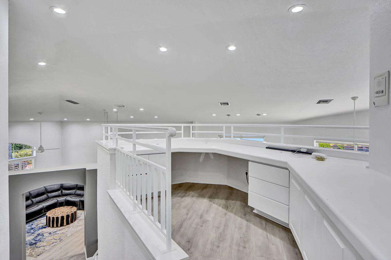 6631 Northwest 43rd Terrace Boca Raton, FL 33496 - Photo 15 of 36 a kitchen with a sink and cabinets
