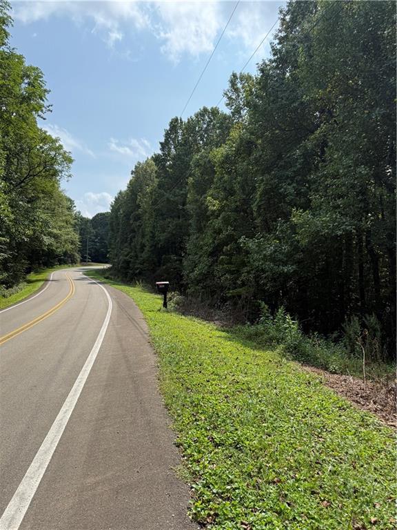 6180 Burnt Mountain Road Ellijay, GA 30536 - Photo 15 of 20 a view of a pathway with a yard