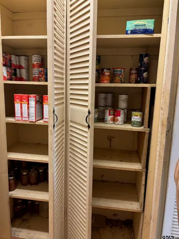 a utility room with washer and dryer