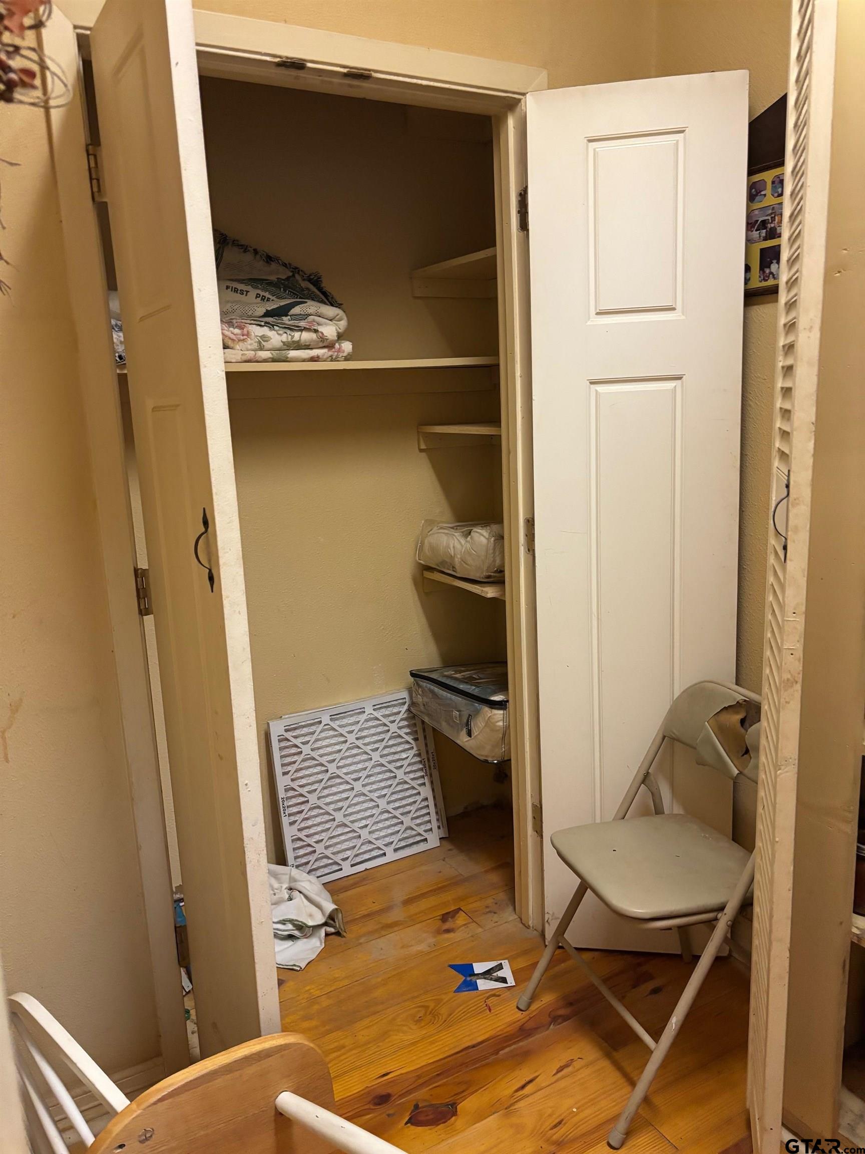 10748 Highway 84 Rusk, TX 75785 - Photo 7 of 15 a room with wooden floor and windows