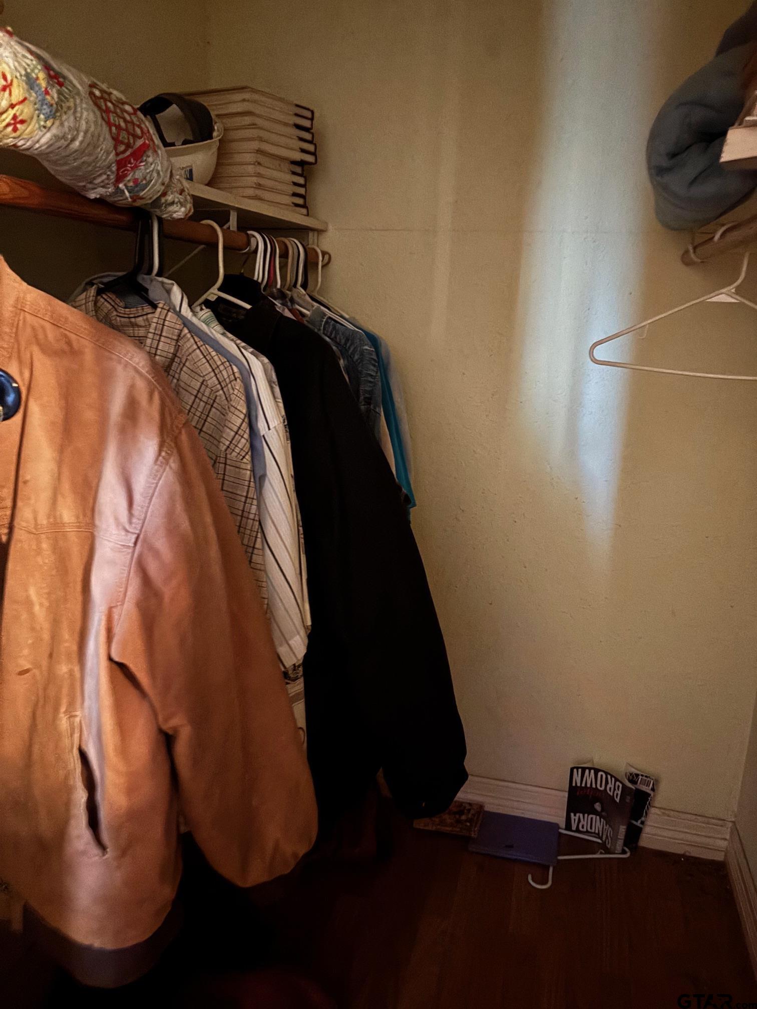 10748 Highway 84 Rusk, TX 75785 - Photo 9 of 15 a view of walk in closet with clothes and shoes