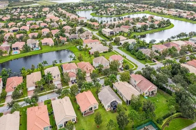 an aerial view of house with yard