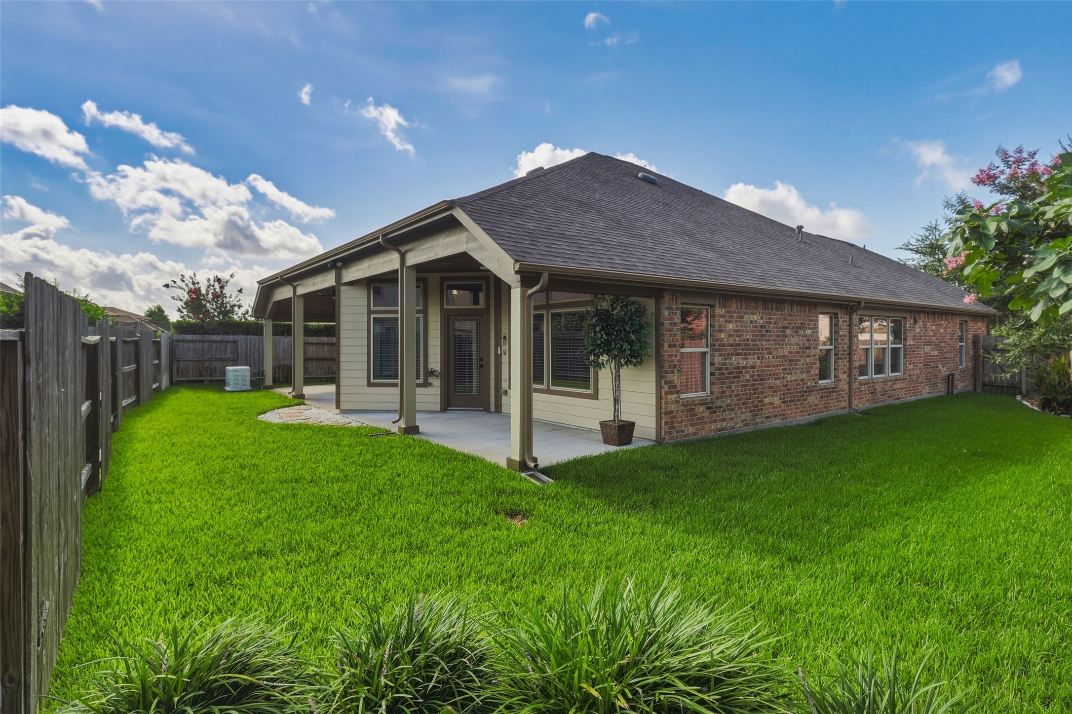 24126 Cane Fields Road Katy, TX 77493 - Photo 5 of 36 Private backyard offering room to play, relax, and entertain.