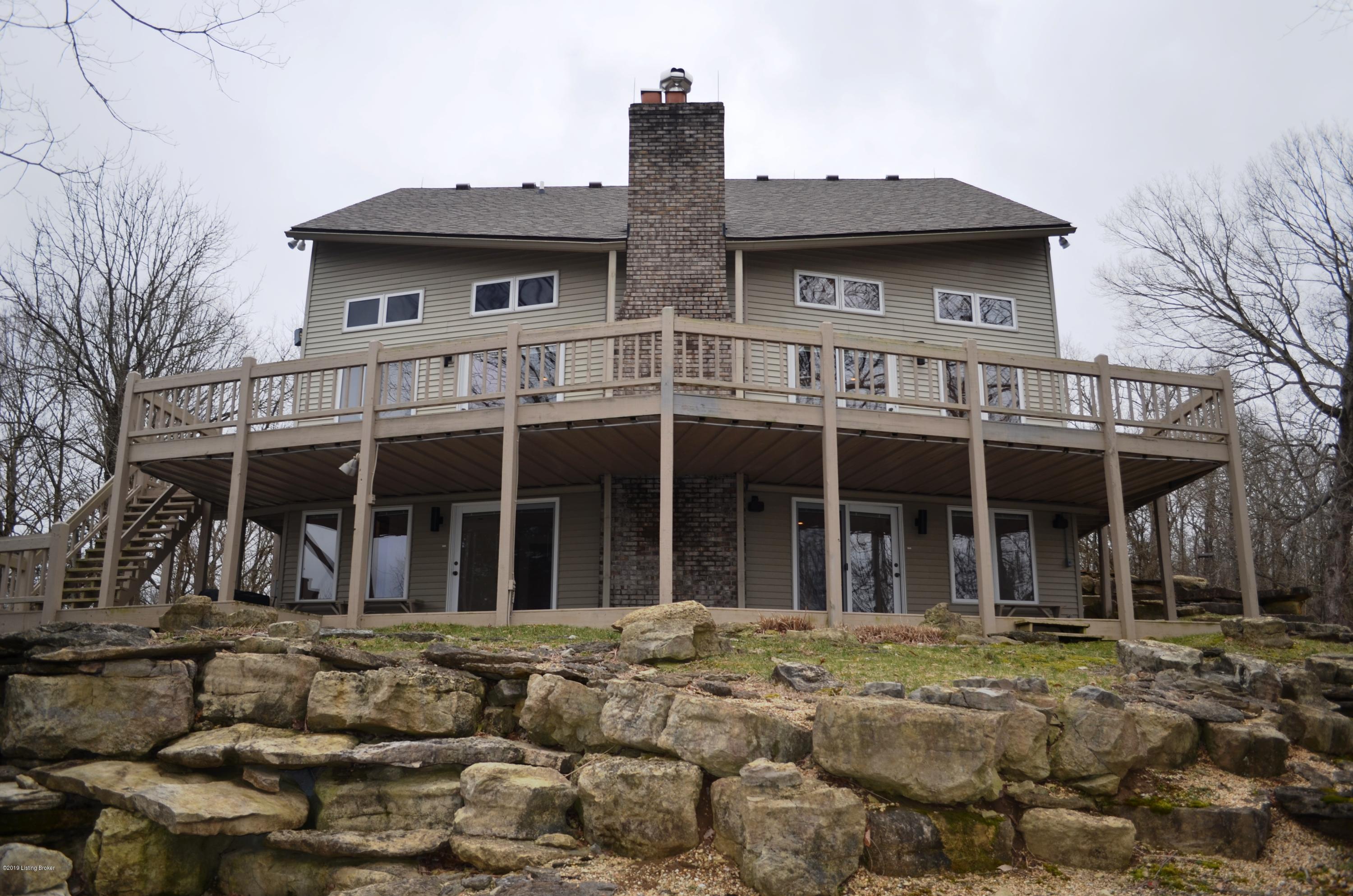 7300 Organ Creek Road Pendleton, KY 40055 - Photo 1 of 30 a house and water fall