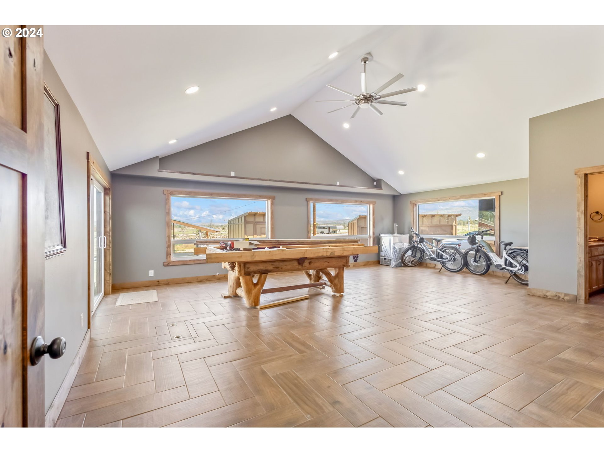 3068 Southwest Reif Road Powell Butte, OR 97753 - Photo 17 of 42 a living room with furniture and a table