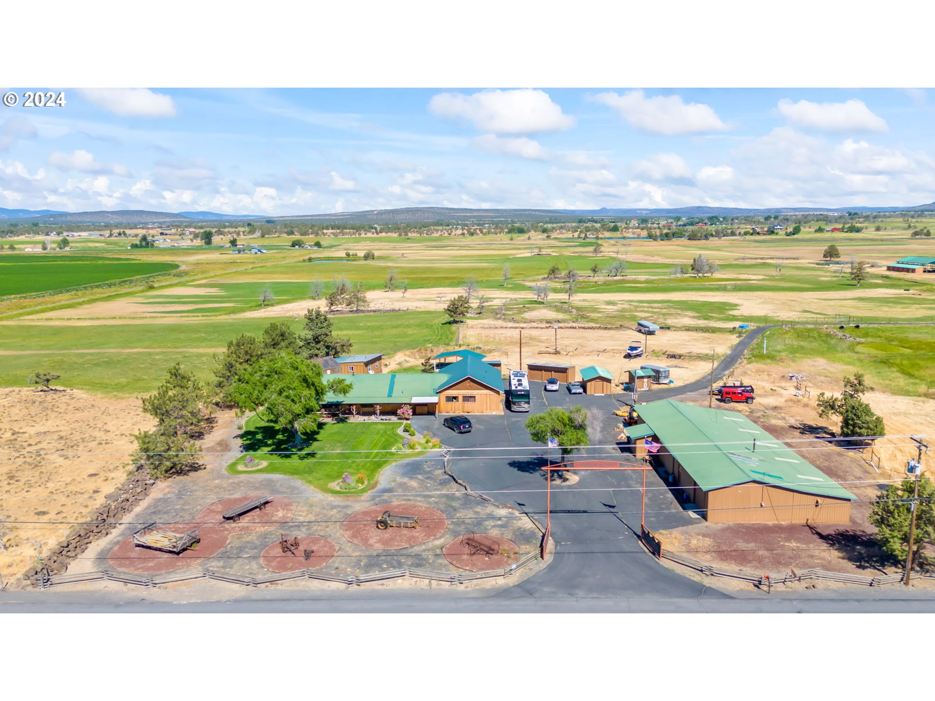 3068 Southwest Reif Road Powell Butte, OR 97753 - Photo 35 of 42 a view of a swimming pool and an outdoor space