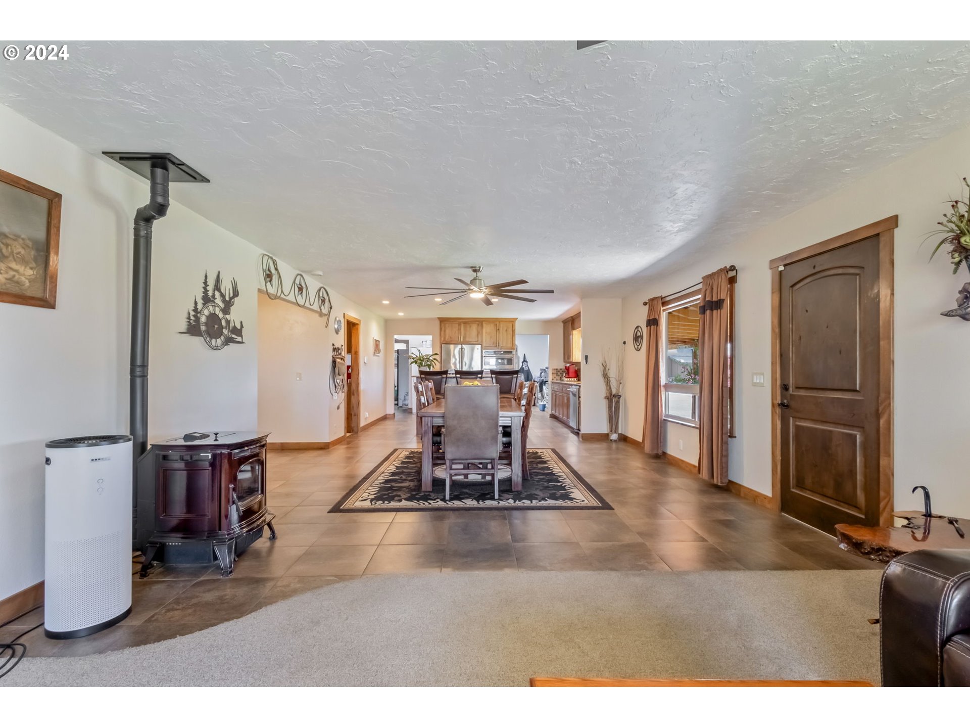 3068 Southwest Reif Road Powell Butte, OR 97753 - Photo 5 of 42 a view of a room with gym equipment