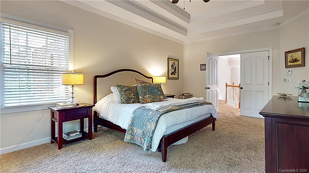 3234 Rhett Butler Place Charlotte, NC 28270 - Photo 12 of 27 a bedroom with a bed and a table