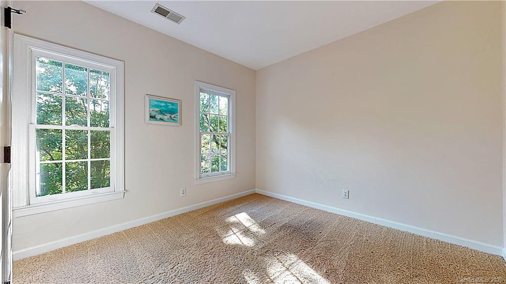 3234 Rhett Butler Place Charlotte, NC 28270 - Photo 17 of 27 an empty room with windows