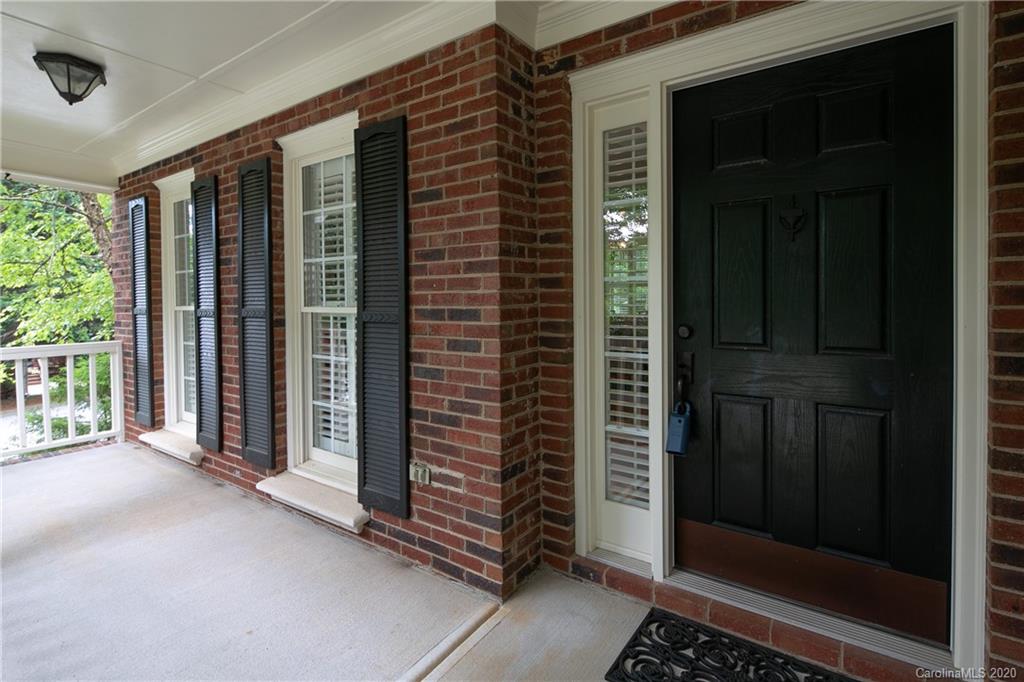 3234 Rhett Butler Place Charlotte, NC 28270 - Photo 3 of 27 a view of a porch with a door