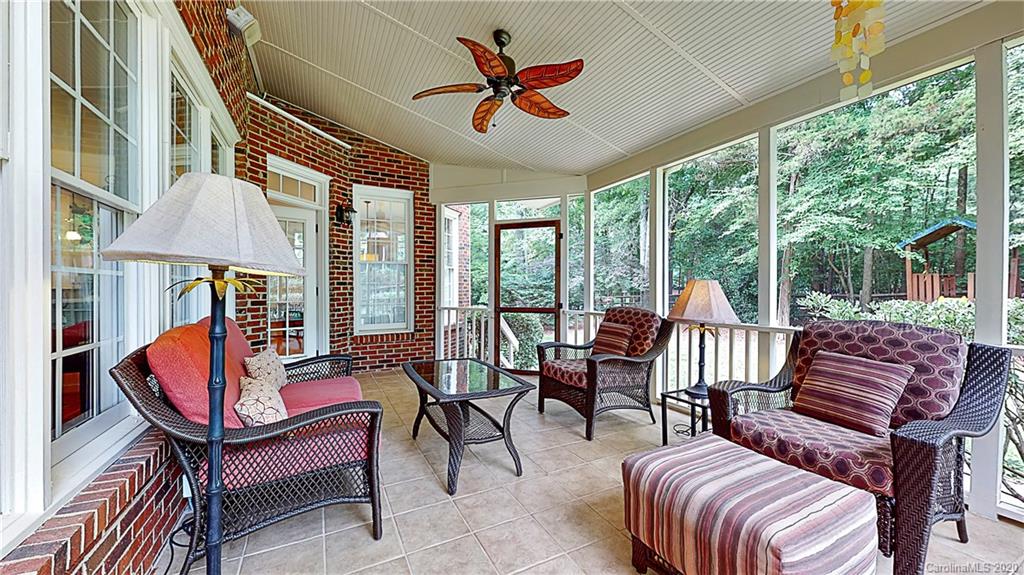 3234 Rhett Butler Place Charlotte, NC 28270 - Photo 22 of 27 a balcony with furniture and outdoor seating