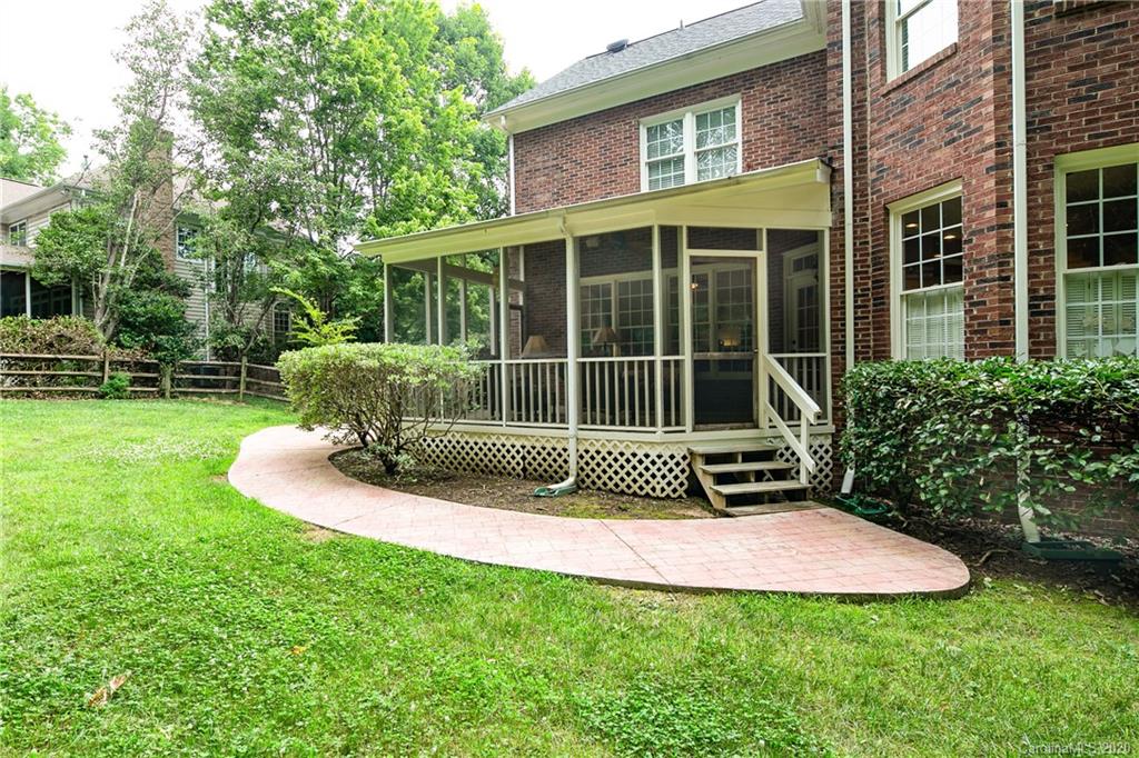 3234 Rhett Butler Place Charlotte, NC 28270 - Photo 23 of 27 a view of a house with backyard and sitting area