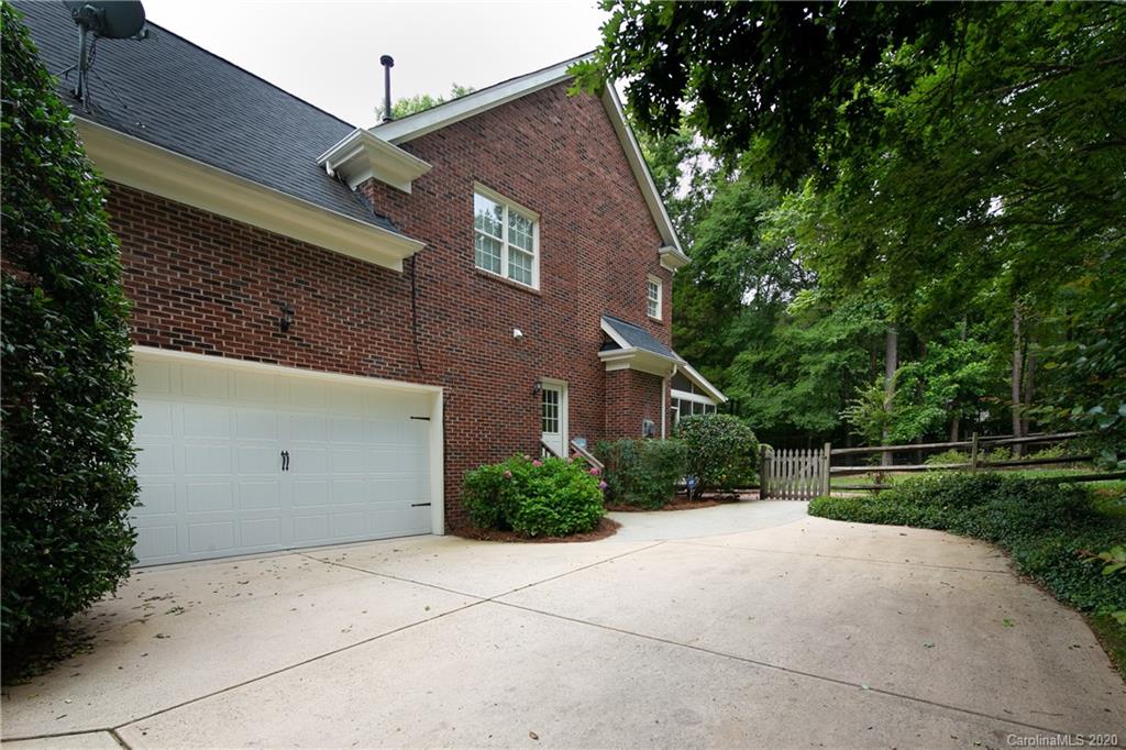 3234 Rhett Butler Place Charlotte, NC 28270 - Photo 26 of 27 a front view of a house with a yard