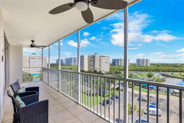 a view of roof deck with couches
