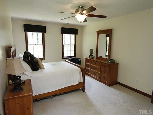 8904 Jeanew Court Raleigh, NC 27613 - Photo 12 of 25 This master bedroom is 19x12.6 and has plenty of room for a chest on side wall near the walk in closet. View to the front and out to the private cul de sac. Master Bedroom