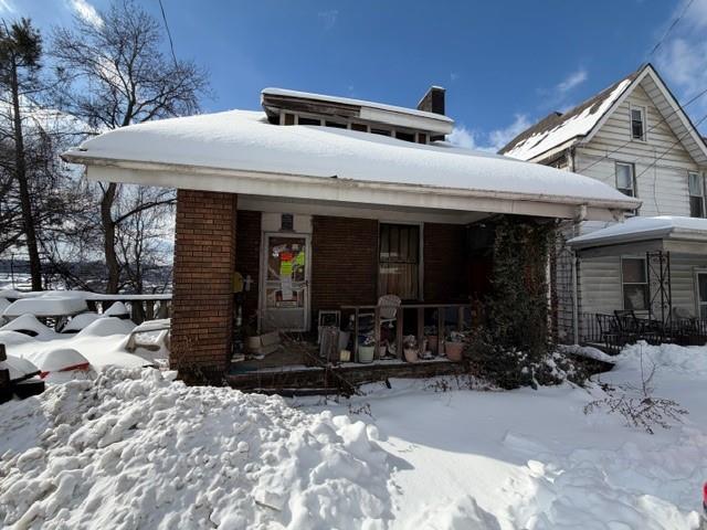 514 5th Avenue Freedom, PA 15042 - Photo 18 of 18 a patio with a table and chairs and potted plants