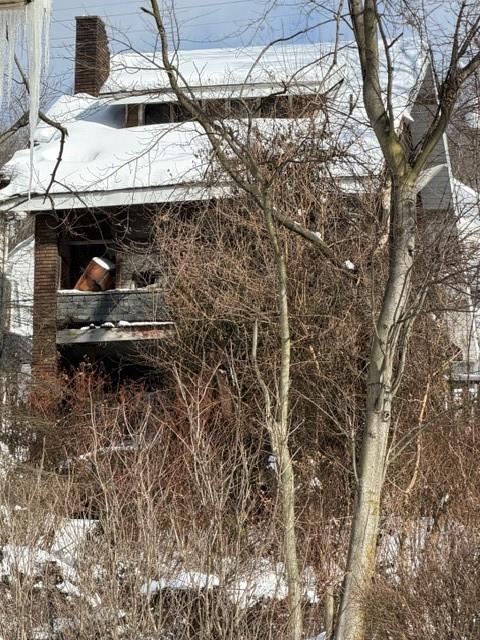 514 5th Avenue Freedom, PA 15042 - Photo 8 of 18 a room with water heater and wooden walls