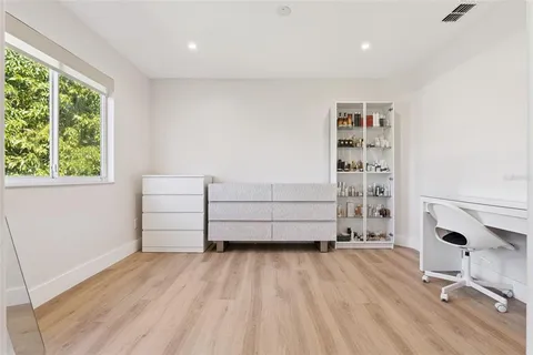 a view of livingroom with furniture and a window